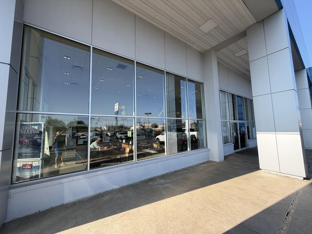 Billion Auto Chevrolet dealership storefront window cleaning, Quad Cities