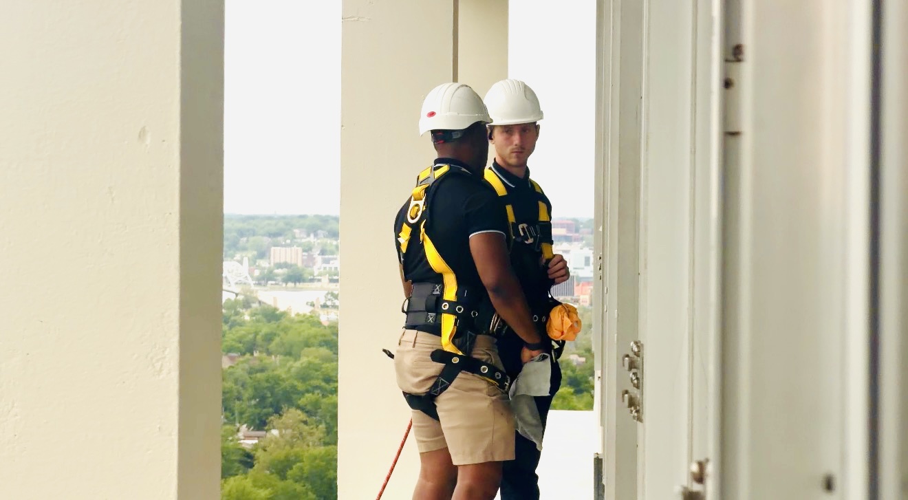 Blues Windows high-rise window cleaning technicians using rope access, Quad Cities, Iowa