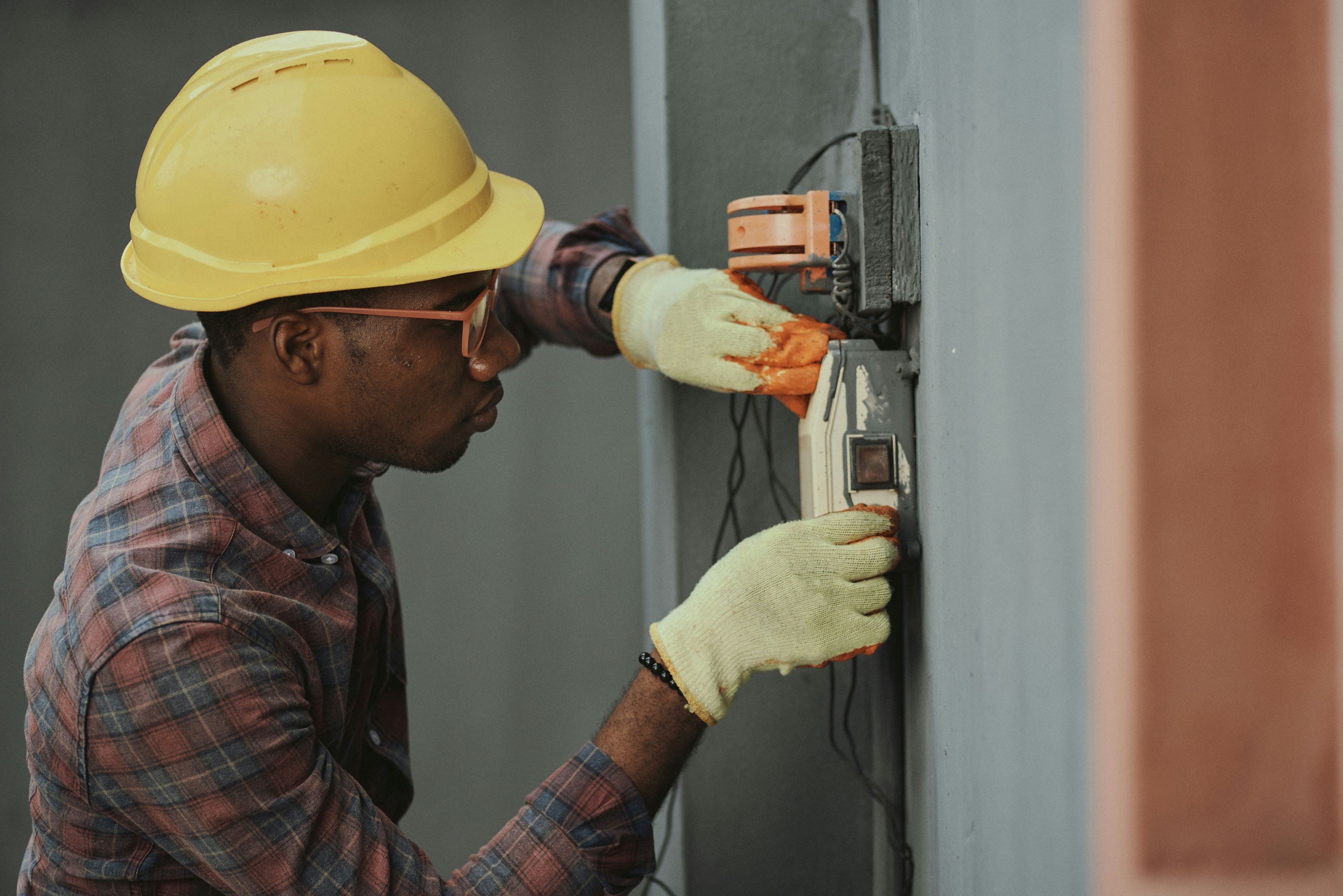 Licensed electrical specialist performing panel repair, Blues Commercial, Quad Cities, Iowa