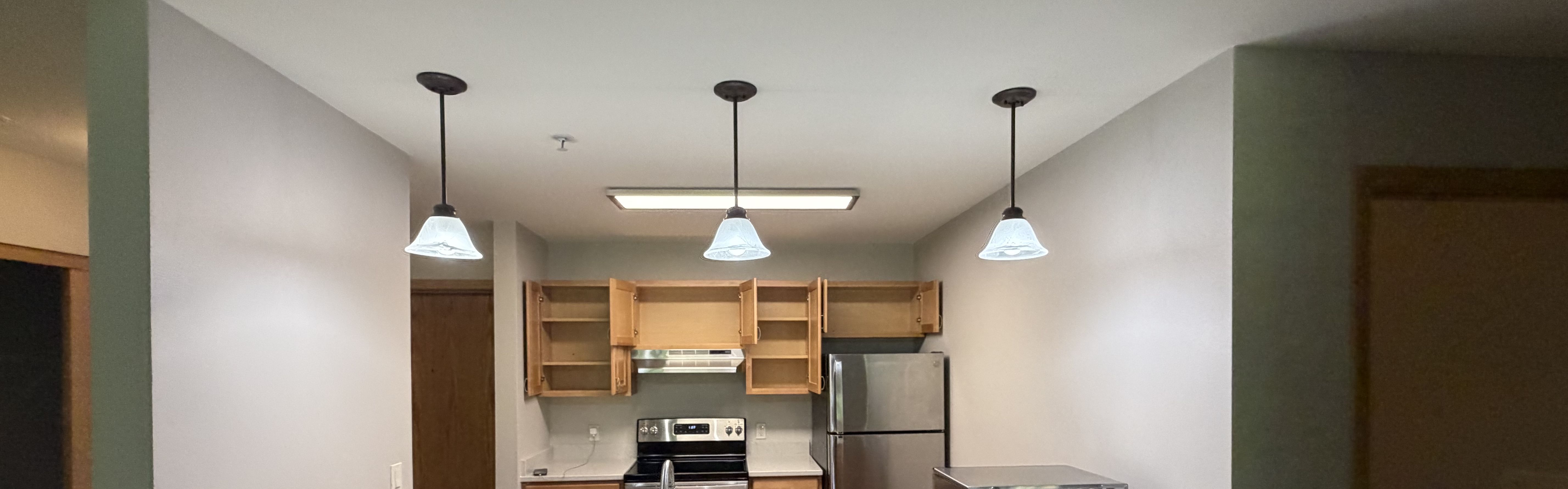Senior Star Elmore Place apartment kitchen after move-out deep clean, Davenport, Iowa